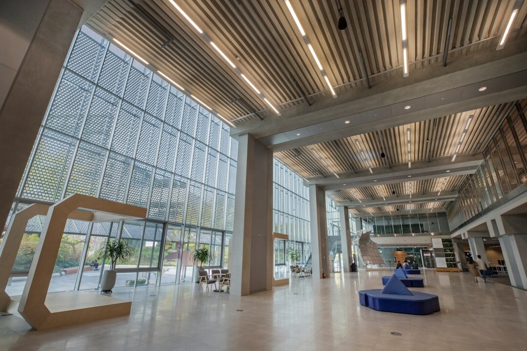Modern media training facility reception area with large windows